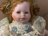 a small doll that is sitting on the floor