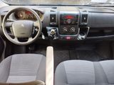 a dashboard of a car with a steering wheel and a dash board