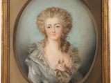 un portrait ovale d'une femme en robe bleue, avec une fleur dans les cheveux