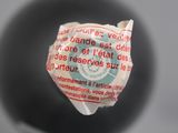 a piece of paper that has been wrapped in a ball