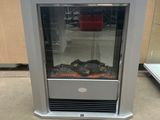 a small oven that is on display in a store