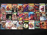 une pile de bandes dessinées posée sur une table noire