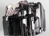 a piece of rock that is on top of a metal stand