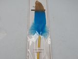 a blue feather pen with a gold tip in a package