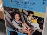 a box with a picture of a child in a car seat