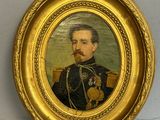 portrait of a man in a military uniform in a gold frame