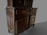 a wooden cabinet with a mirror on top of it