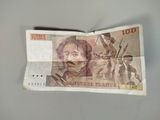 a piece of paper that has a picture of a man on it