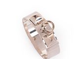 a close up of a ring on a white background