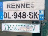 two street signs on the back of a truck