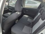 the back seats of a car are black and gray