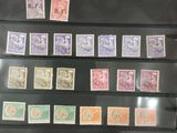 a display case with a lot of different stamps on it