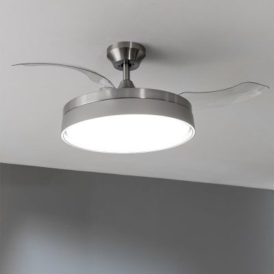 a close up of a ceiling fan with a light on it