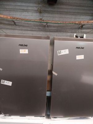 two refrigerators that are sitting on a shelf in a store
