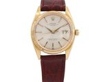 a gold and white wrist watch with a brown leather strap