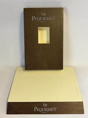 the book is sitting on top of a wooden stand