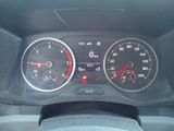 a close up of a car dashboard with various gauges