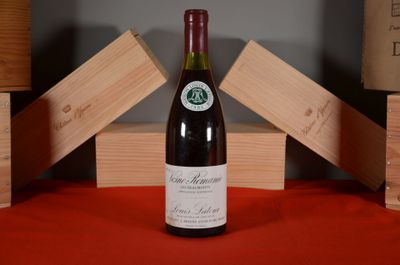 a bottle of wine that is sitting on a table