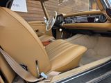 a car with a tan leather interior and tan leather seats