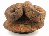 an image of a clay sculpture of a snake on a plate