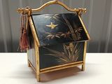 a black and gold box sitting on a table
