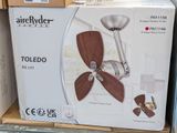 a box with a fan inside of it on a store shelf