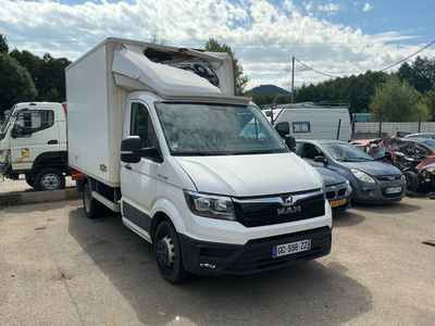 a white van that is parked in a parking lot