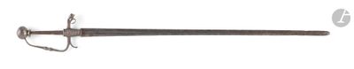 a small sword that is on a white surface