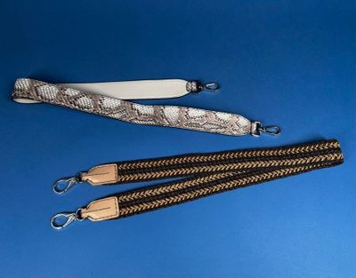 two lanyards and a lanyard strap on a blue background