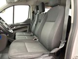a view of the inside of a vehicle with the seats down