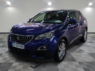 a picture of a blue suv parked in a garage