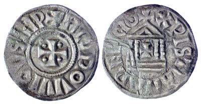 une pièce d'argent sur laquelle figure l'image d'une couronne