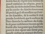 an old book with a black and red writing on it