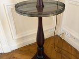 a lamp that is sitting on a table in a room