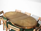 une table à manger avec six chaises et une grande table à manger ovale avec six chaises