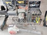a lot of tools that are sitting on the floor