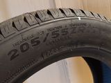 a close up of a tire on a table with a box in the background