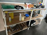a workbench with tools on top of it in a garage