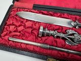 a picture of a knife and a sword in a case