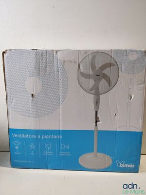 a box with a fan inside of it on a table