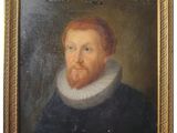 a painting of a man with a beard in a gold frame