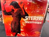 a poster of a woman holding a knife in a store