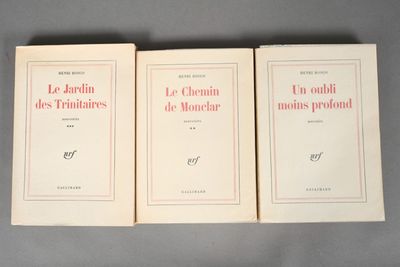 three books sitting on top of a table next to each other
