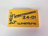 a close up of a yellow ticket with a mickey mouse on it
