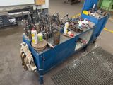 a blue cart with a lot of tools on it