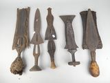 several different types of tools are displayed on a white surface