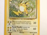 a yellow pokemon card with a picture of a pikachu on it