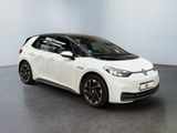 the white toyota corollant is parked in a large room