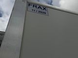 the back of a white truck with a sign on it ' s side