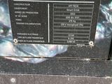 a black plaque on the side of a building